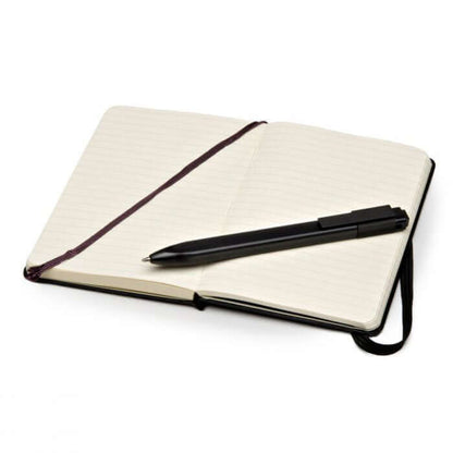 MOLESKINE A6 Notebook with Roller Pen Set open showing ruled pages and black roller pen