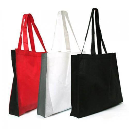 Non-Woven Bag (36x30x6) in red, white, and black for eco-friendly carrying options.
