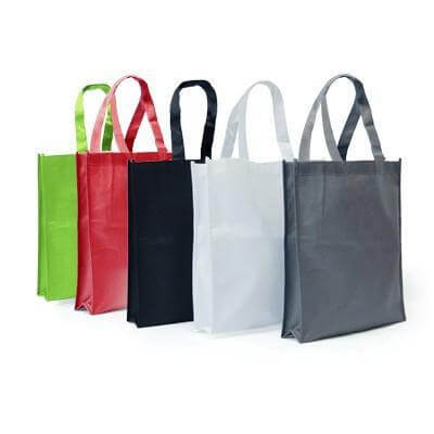 Portrait Non Woven Bag collection in various colors including Black, Grey, Green, Red, and White.