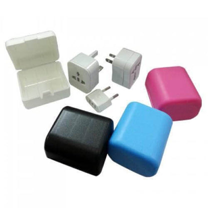Travel Adaptor with box featuring interchangeable prongs in various colors for international use.