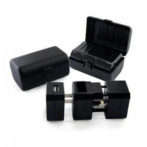 Travel Adaptor With USB Hub And box in black with detachable prongs and protective case.