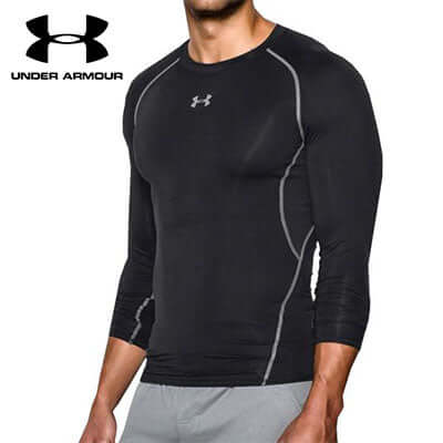 Under Armour Long Sleeve Compression Shirt worn by a male model, showcasing its sleek design and fit.