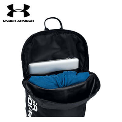 Under Armour Patterson Backpack showing laptop sleeve and blue shirt inside the spacious compartment.
