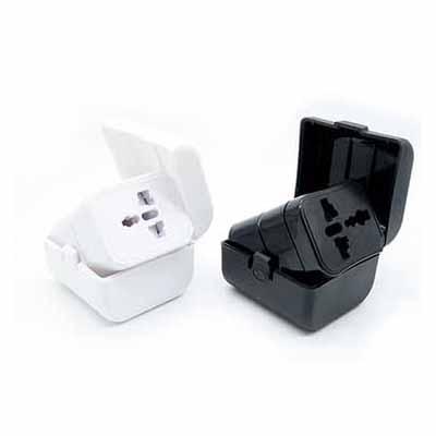 Universal Travel Adapter With Box in black and white, featuring a compact design perfect for travelers.