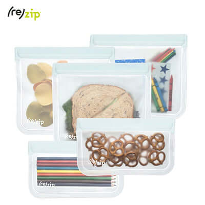 Rezip 5-piece Lay-Flat Starter Leakproof Reusable Storage Bag Kit with various snacks and supplies.
